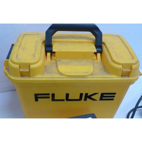 2027 - 2 Fluke tool boxes with various items inside including: a Fluke 6200 appliance tester, a Fluke 1653 ... 