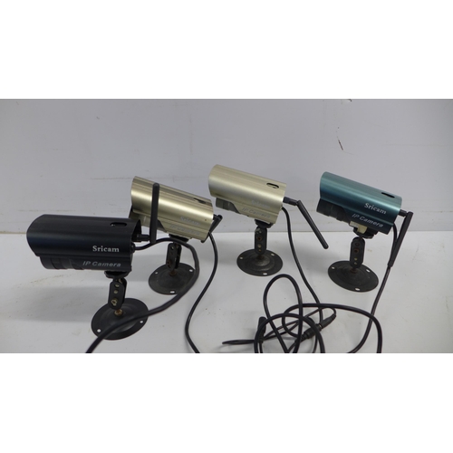 2029 - 4 SRI-CAM IP security cameras with cables and installation CD