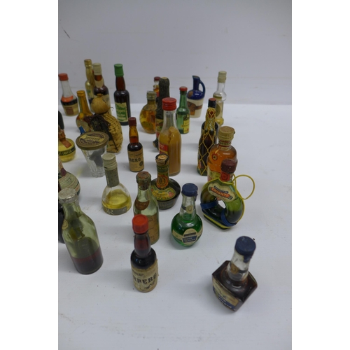 2038 - A box of approx. 60 vintage miniatures and match boxes including Dimple Scots scotch whisky, Chianti... 