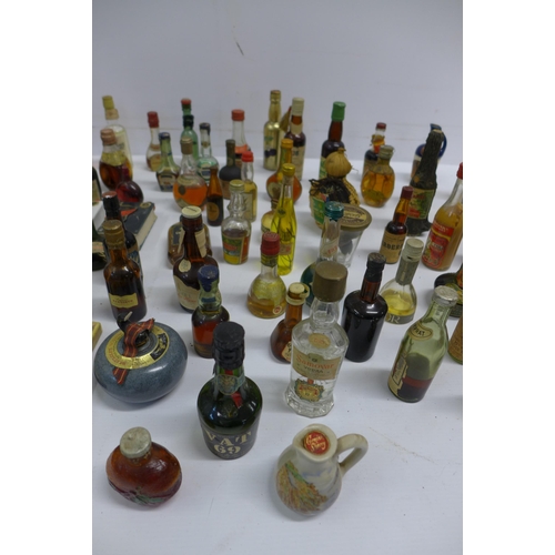 2038 - A box of approx. 60 vintage miniatures and match boxes including Dimple Scots scotch whisky, Chianti... 