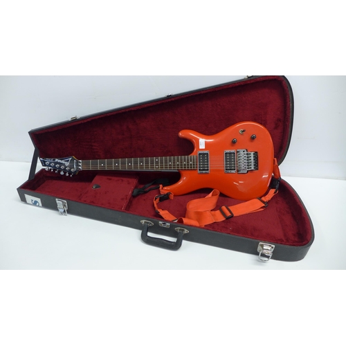 2077 - An Ibanez JS Series Joe Satriani signature candy apple red 6 string electric guitar (serial no. J001... 