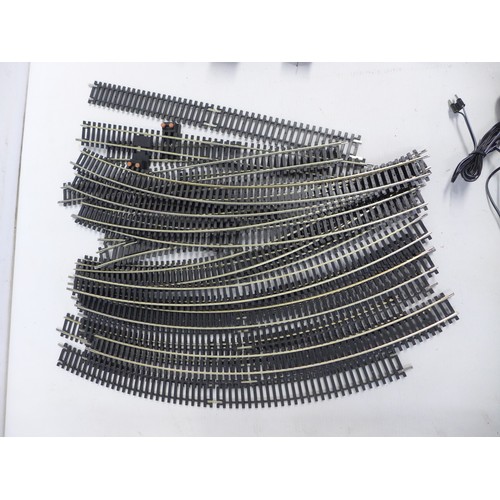 2048 - A quantity of Hornby OO gauge model railway track, carriages, electronic train controller etc.