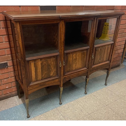 112 - An Edward VII rosewood three door side cabinet, on gilt metal legs