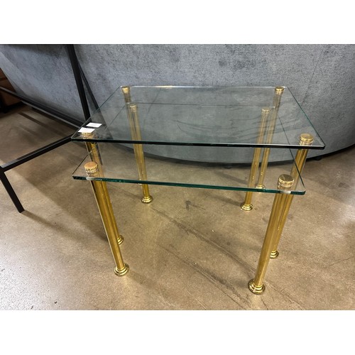 1394 - A nest of two tables with solid brass legs