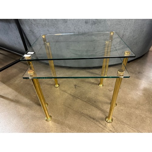 1394 - A nest of two tables with solid brass legs