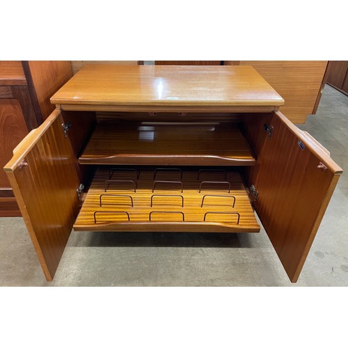 23 - A Danish Sakol teak two door media cabinet