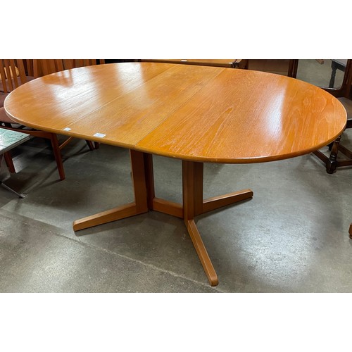 29 - A teak drop leaf table