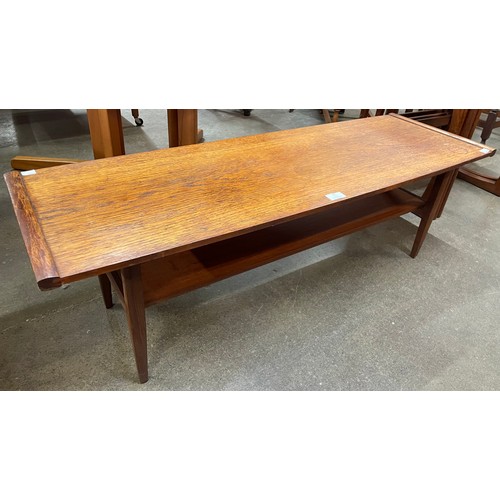 33 - A teak coffee table