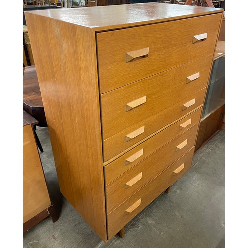 70 - A light oak chest of six drawers