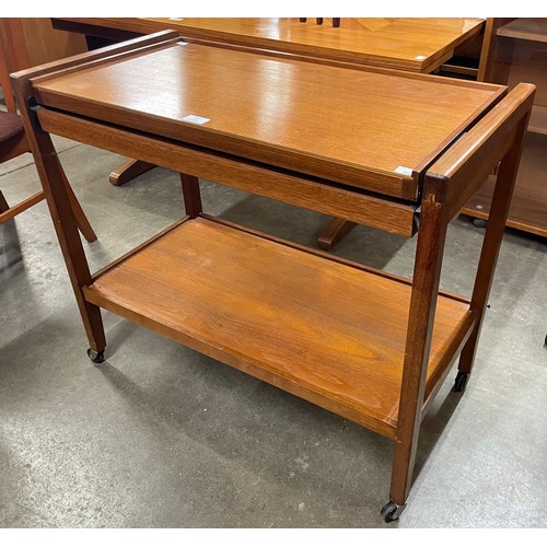 80 - A metamorphic teak trolley