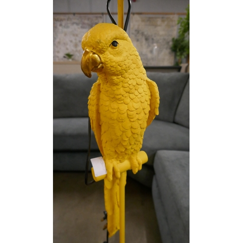 1342 - A yellow floor standing lamp in the form of a parrot