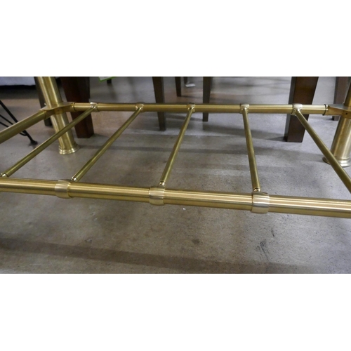 1361 - A coffee table with solid brass rack