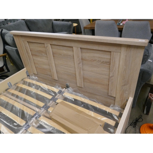 1380 - An ash effect king size bed frame *This lot is subject to vat