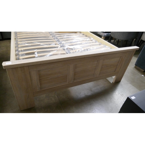 1380 - An ash effect king size bed frame *This lot is subject to vat