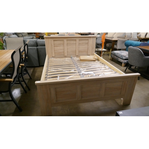 1380 - An ash effect king size bed frame *This lot is subject to vat