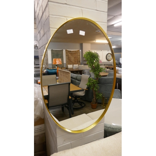 1390 - A gold framed oval mirror