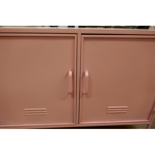 1468 - A pink two door industrial style cabinet