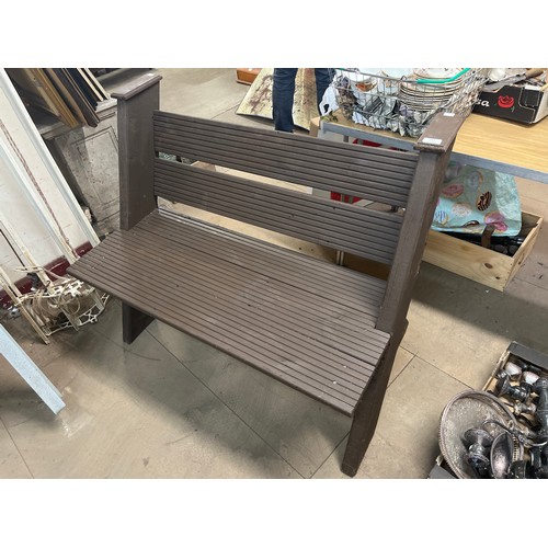 267 - A painted pine garden bench