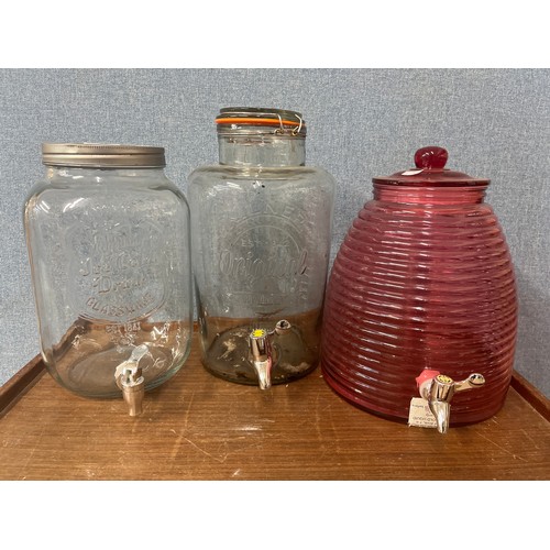 272 - Three glass dispenser jars