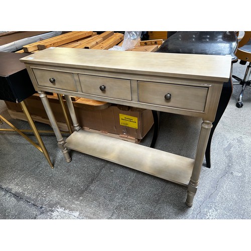 1545 - A three drawer console table