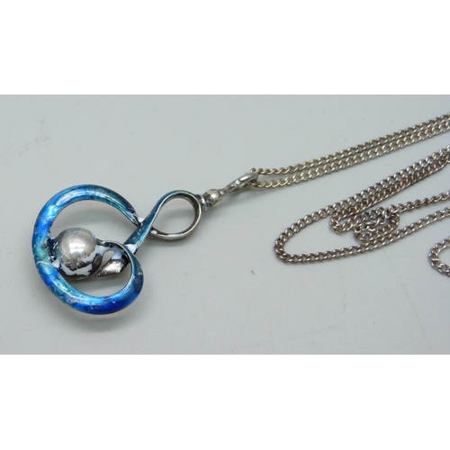 1063 - A Charles Horner silver and enamel pendant on a white metal chain, enamel a/f, 4cm