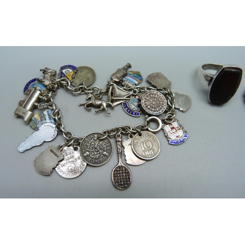 1076 - A silver Georg Jensen locket, a silver ring, and a plated bracelet with silver, white metal and plat... 