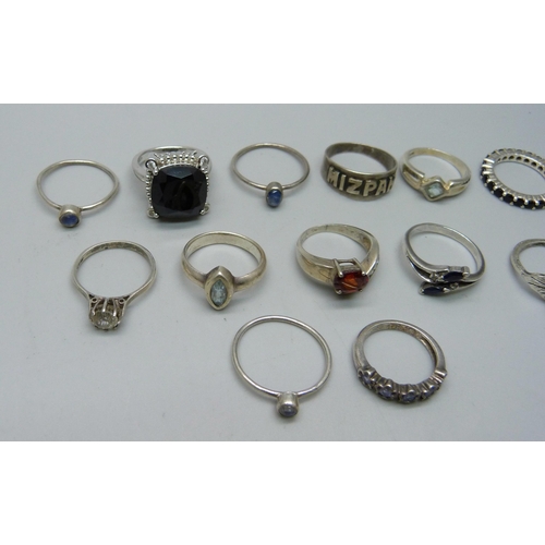 1088 - Ten silver rings, three white metal rings and a plated ring, 39g