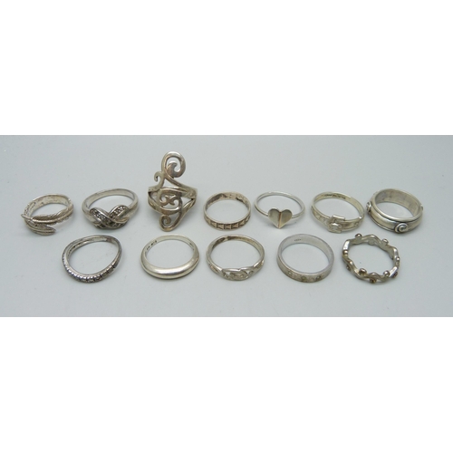 1104 - A 9ct gold ring, 3g, nine silver rings, 28g, and two plated rings