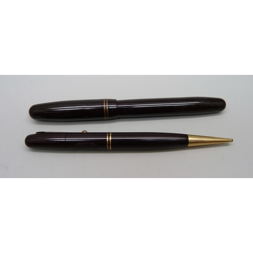 1125 - A Swan Mabie Todd fountain pen with 14ct gold nib, and a matching propelling pencil