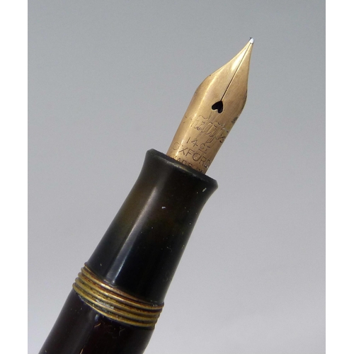 1125 - A Swan Mabie Todd fountain pen with 14ct gold nib, and a matching propelling pencil