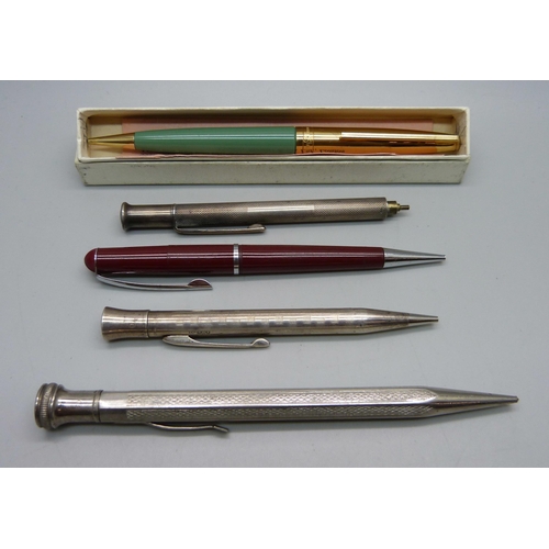 1128 - A boxed Conway Stewart 49 propelling pencil, two silver pencils, one a/f, and two other propelling p... 