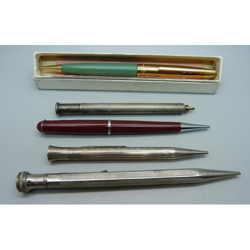 1128 - A boxed Conway Stewart 49 propelling pencil, two silver pencils, one a/f, and two other propelling p... 