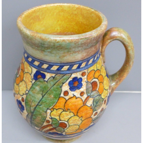 607 - A Crown Ducal tube lined jug, 25.5cm