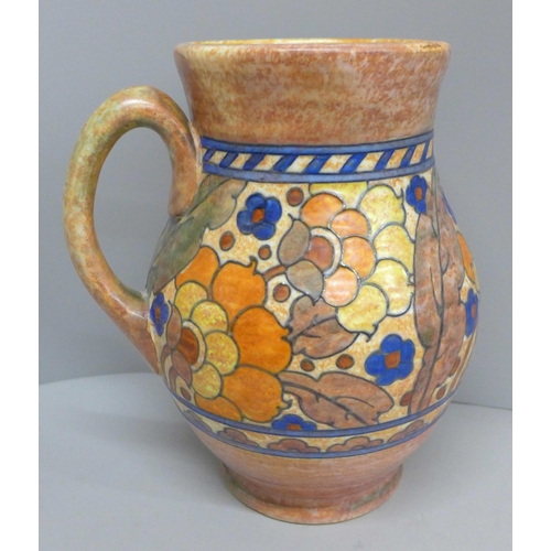 607 - A Crown Ducal tube lined jug, 25.5cm