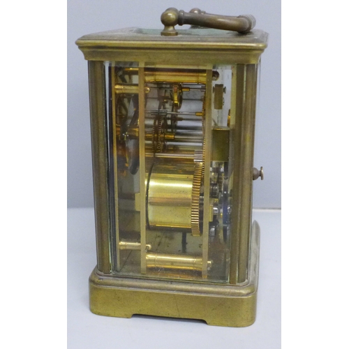 619 - A brass carriage clock, the dial marked Manoah Rhodes & Sons, Bradford