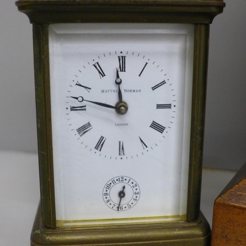 644 - A Matthew Norman carriage clock and one other wooden cased clock