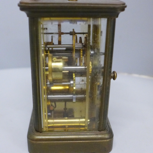 644 - A Matthew Norman carriage clock and one other wooden cased clock