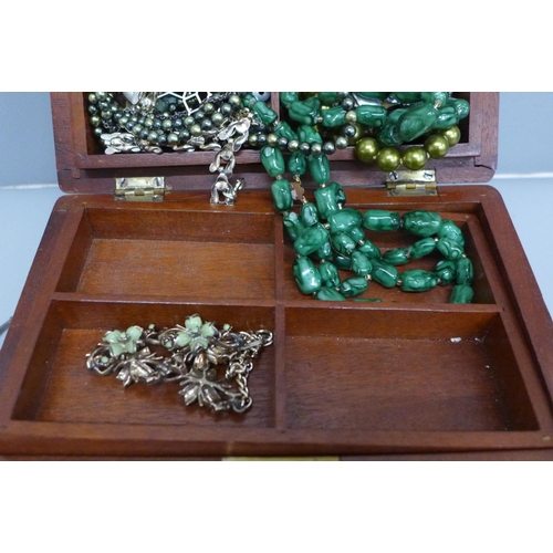 650 - Costume jewellery including silver in a polished wooden box