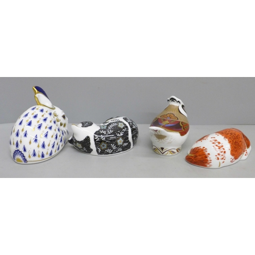 655 - Four Royal Crown Derby paperweights, three with gold stoppers, rabbit with silver stopper