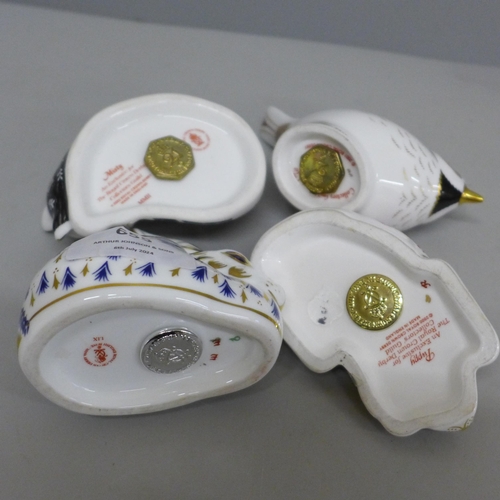 655 - Four Royal Crown Derby paperweights, three with gold stoppers, rabbit with silver stopper