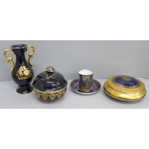 661 - A silver holder with Staffordshire porcelain coffee can and saucer and three pieces of Limoges china