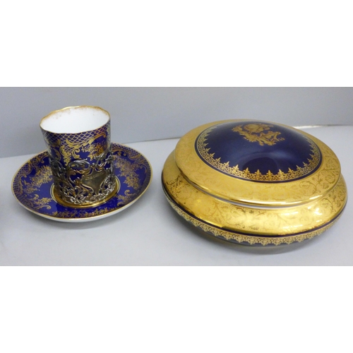 661 - A silver holder with Staffordshire porcelain coffee can and saucer and three pieces of Limoges china