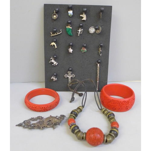 669 - Chinese jewellery, silver and white metal charms, etc.