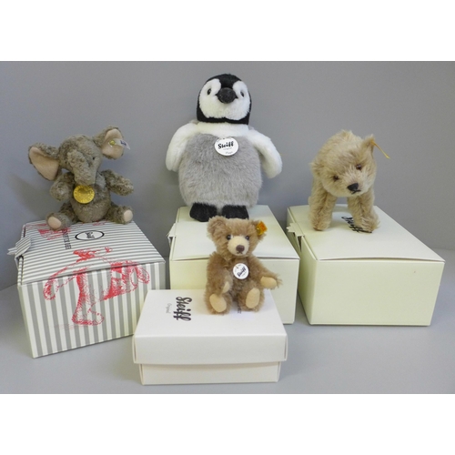 670 - Four small Steiff teddy bears; Elephant, Penguin, Bear and miniature mohair, boxed