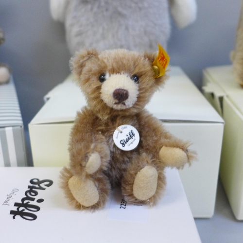 670 - Four small Steiff teddy bears; Elephant, Penguin, Bear and miniature mohair, boxed