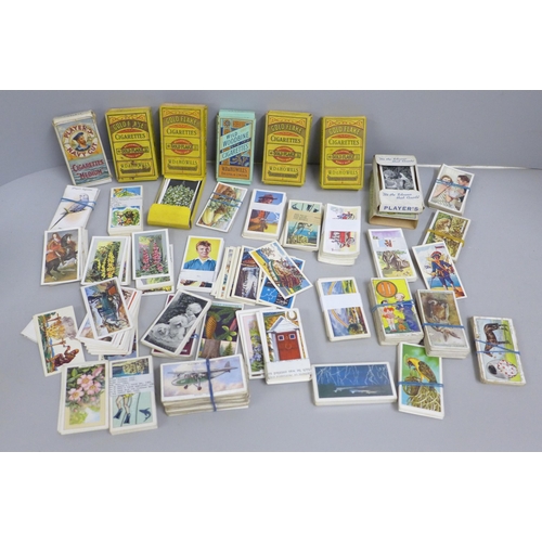 671 - Cigarette cards - six full sets and a bag of part sets and single cards in original packets