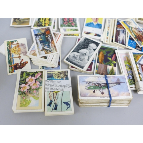 671 - Cigarette cards - six full sets and a bag of part sets and single cards in original packets