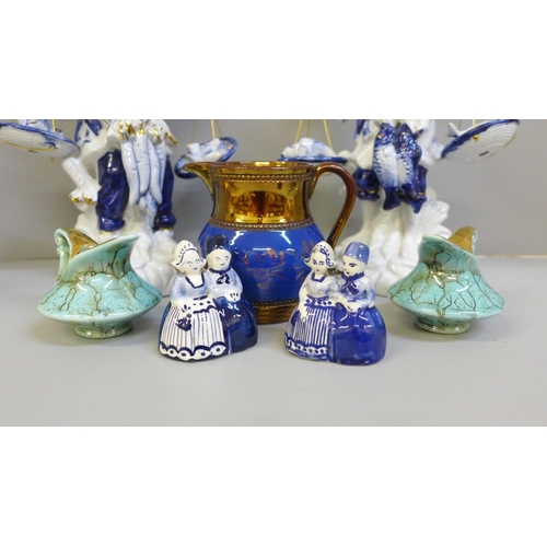 681 - Two Chinese blue and white figures, three small jugs and two Dutch figures