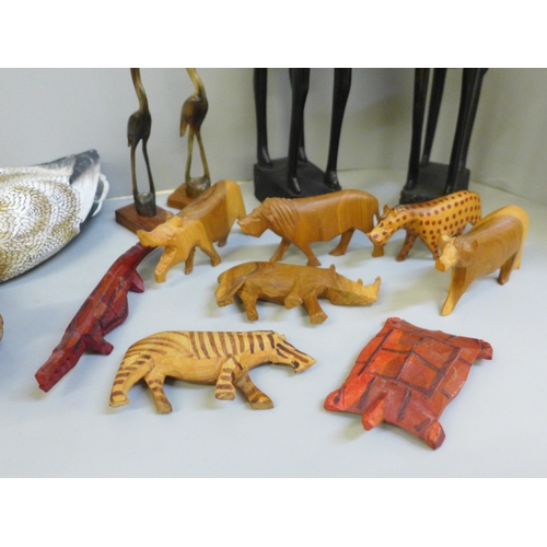 682 - A collection of carved animals including carved horn