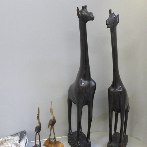 682 - A collection of carved animals including carved horn